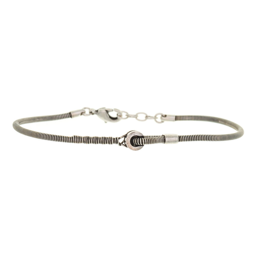 delia - joaillerie - diamant - vente - bijoux - 14 carats - bellon - or 18 carats - sur mesure - sing a song - lopé - lope - galeries marval - neuchâtel - neuchatel - faconnier - façonnier